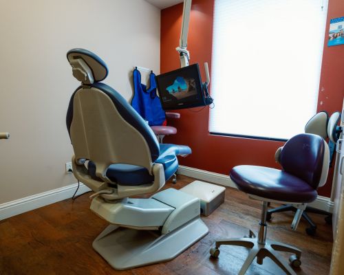 Modern dental office with comfortable patient chair and advanced equipment for general dentistry procedures
